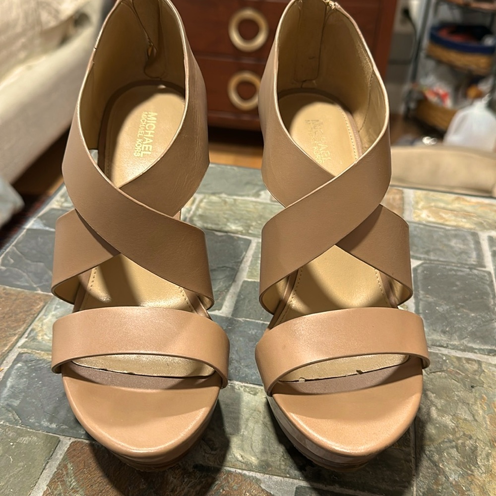 Micheal Kors tan stiletto platform zip back heels.   Worn once. Sz8